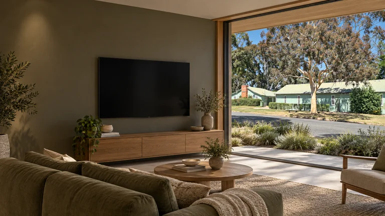 Ainslie — Room concept with a wall-mounted TV and a view inspired by Corroboree Park Hall (Ainslie Hall).