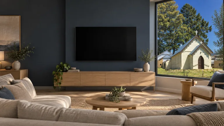 Calwell — Room concept with a wall-mounted TV and a view inspired by Sacred Heart Church.