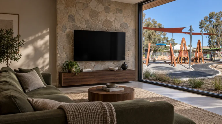 Duffy — Room concept with a wall-mounted TV and a view inspired by Duffy shops playground.