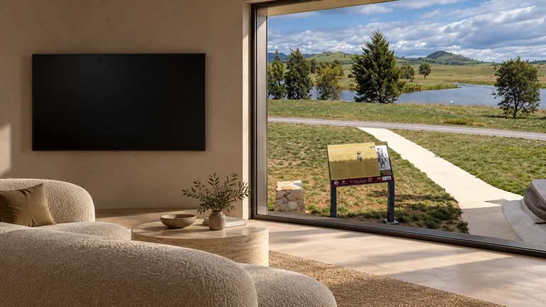Dunlop — Room concept with a wall-mounted TV and a view inspired by Border Walk surveyors interpretive marker beside West Belconnen Pond.