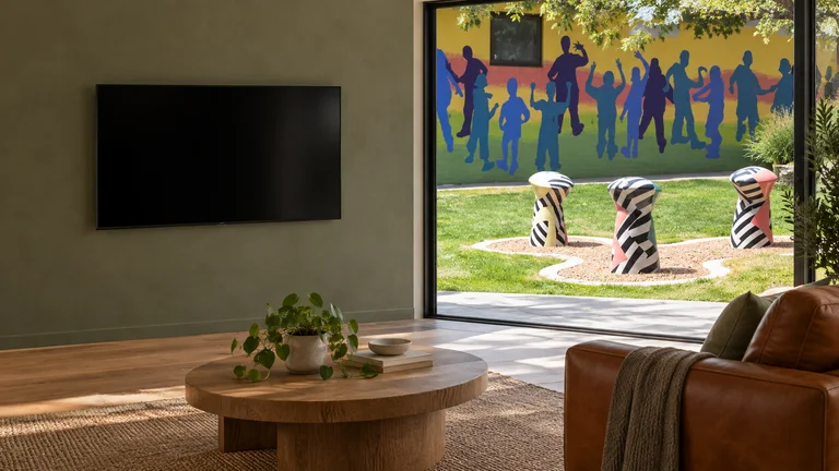 Holt — Room concept with a wall-mounted TV and a view inspired by Holt Shops public artwork.