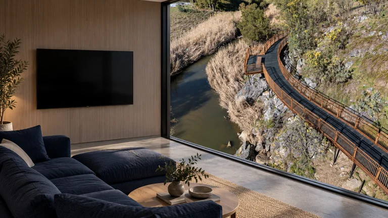 Latham — Room concept with a wall-mounted TV and a view inspired by Umbagong Park bridge 1193.