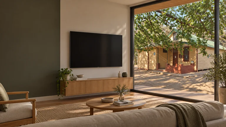 O’Connor — Room concept with a wall-mounted TV and a view inspired by 13th Canberra Scout Hall.